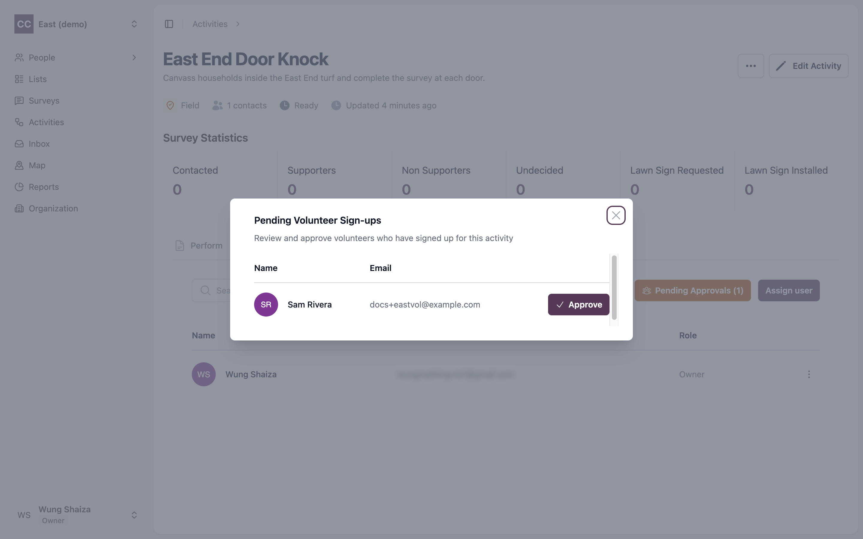 The Pending Volunteer Sign-ups list with an Approve button